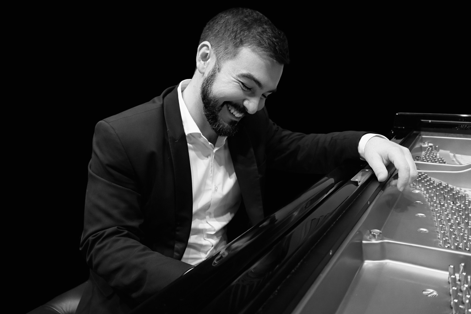 Giuseppe D’Aloi playing piano